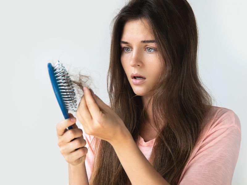 A woman shock of her hair loss